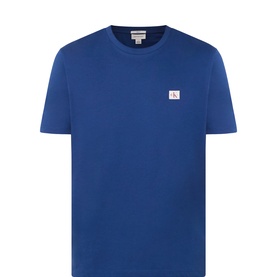 Calvin Klein Jeans Estate Blue cotton crew neck T-shirt with small logo patch on chest, no model