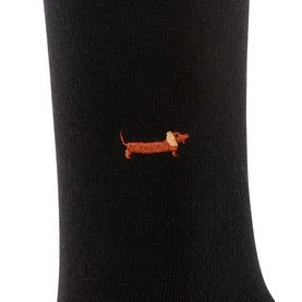 Falke black socks with small embroidered brown dachshund motif on the cuff, close-up detail shot.