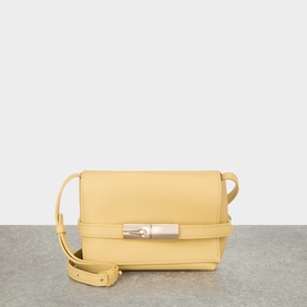 Longchamp Foin yellow leather crossbody bag with silver twist-lock clasp and adjustable shoulder strap