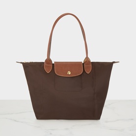 Longchamp Le Pliage shoulder bag in Moka, tan leather handles and flap with gold press-stud closure, structured nylon body