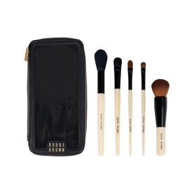 Bobbi Brown Brush Set with 5 cream and black handled brushes displayed in front of a black zip case