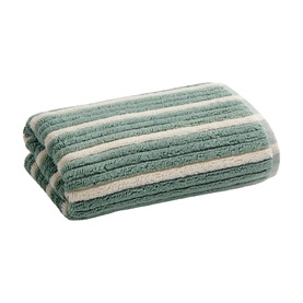 Christys bath towel in sage green and cream stripes, folded to show thick terry cloth texture