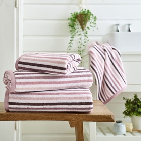 Deyongs Linear Stripe Towel Pink, 100% cotton, pink and brown horizontal stripes, set of three sizes styled in a bathroom setting