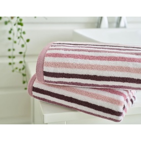 Deyongs Linear Stripe Towel Pink in 100% cotton, folded stack showing pink, white and plum horizontal stripes, bathroom setting
