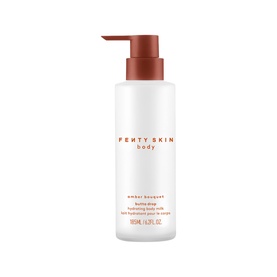 Fenty Skin Amber Bouquet Butta Drop Hydrating Body Milk in white pump bottle with terracotta-toned cap, 195ml