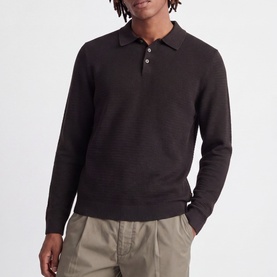 Model wearing Jack & Jones Riley Knitted Polo Shirt in Ganache, long sleeves, quarter-button collar, styled with beige trousers