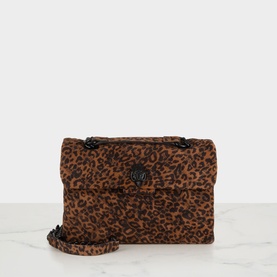 Kurt Geiger brown leopard-print suede crossbody bag with black hardware, quilted flap, and chain-link shoulder strap