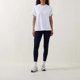 Model wearing Lululemon All Yours T-Shirt in white, styled with navy leggings and white trainers