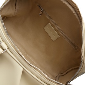 Marc Jacobs bone leather top handle bag interior view showing zip pocket, gold-tone zip and smooth beige lining