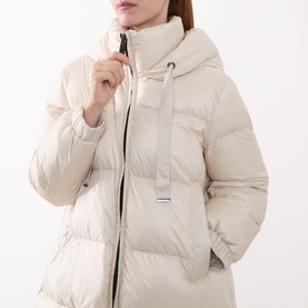Model wearing Max Mara Cube vanilla padded down coat with hood, zip fastening and drawstring detail, cropped view.