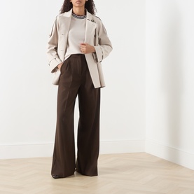 Model wearing Max Mara S Carina Contrast Trim Sweater in Albino with wide-leg brown trousers and a beige blazer.