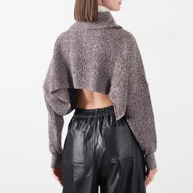 Model wearing Max Mara Sportmax rust bl wool cashmere cropped turtleneck knit, open back, styled with black leather trousers, rear view