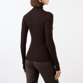 Model wearing Max Mara Sportmax chocolate wool roll-neck top, back view, styled with matching wide-leg trousers.
