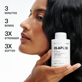 Model with Olaplex N&deg;3 Plus Complete Repair Treatment bottle, long dark hair styled sleekly, text highlights 3 minutes, 3 bonds, 3x stronger and