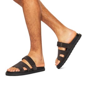 Model wearing KG by Kurt Geiger brown leather strap sandals with toe loop, triple band detail and black rubber sole