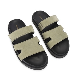 KG by Kurt Geiger green suede double-strap slides with black cushioned footbed and chunky black sole