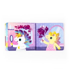 Tiger Tribe multi-coloured children's book open spread showing two unicorn characters, one with rainbow hair holding a mirror, one in pink dress