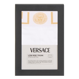 Versace Low Rise Trunk in white with gold Medusa and Greek key motifs, shown in branded box packaging.