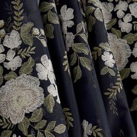Hobbs Midnight Ivory dress fabric close-up showing navy base with cream and green floral embroidery detail