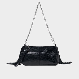 Maje red leather shoulder bag with silver chain strap, fringe side details, and charm pendant