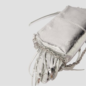 Maje silver metallic mini bag with fringe and chain strap detail, close-up shot