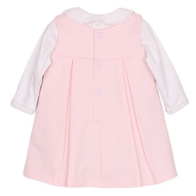 Emile Et Rose baby pink dress back view, long white sleeve top underneath, button fastening, pleated skirt detail
