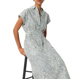 Model wearing Whistles blue ditsy print midi shirt dress with elasticated waist, short sleeves and collared neckline