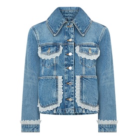 Ganni Lace-Trim Denim Jacket in dark blue with white lace trim detailing, enlarged collar, chest flap pockets, and flared hem. 100% cotton.