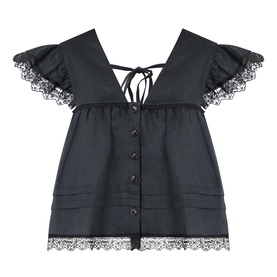 Ganni Angel Linen Blouse in black with V-neckline, lace-trimmed cap sleeves, front button placket, and flared hem with layered pleats