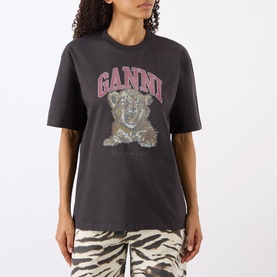 Model wearing Ganni Tiger Heavyweight Logo T-Shirt in Phantom, with tiger graphic and logo print, styled with zebra-print trousers.