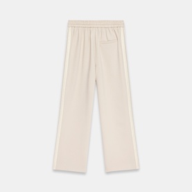 Mint Velvet Side Stripe Mid-Rise Wide Leg Trousers in cream, with contrast side stripes, elasticated waist and wide-leg silhouette.