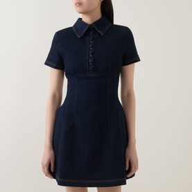 Model wearing Odd Muse dark blue mini dress with collar, short sleeves, contrast stitching and button placket detail.