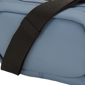 Rains Bum Bag in Blue Dusk, close-up of quilted body with black webbing strap detail, 100% polyester