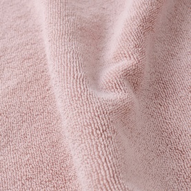 Christys petal pink bath towelling fabric close-up showing soft looped terry texture