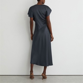 Model wearing Reiss slate grey midi dress with short flutter sleeves and A-line skirt, styled with tan heeled sandals, back view