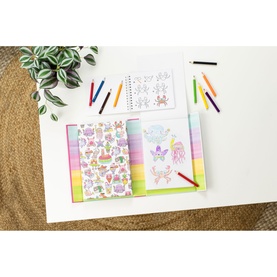 Tiger Tribe arts and crafts set with colouring books, sticker sheet, and coloured pencils arranged on a white surface with plant