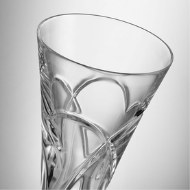 Waterford clear crystal vase with swirling cut pattern, flared rim, close-up detail shot showing decorative motif