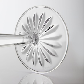 Waterford clear crystal glass base detail, showing intricate starburst cut pattern radiating from centre stem