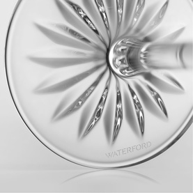 Waterford clear crystal glass base detail showing intricate starburst cut pattern with brand engraving visible