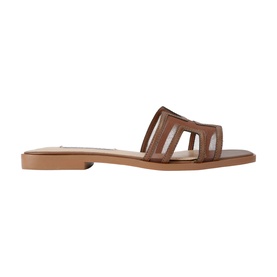Steve Madden brown leather cage-strap flat slide sandal with open toe and tan sole, side profile view