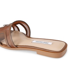 Steve Madden brown leather flat slide sandal with curved cutout strap detailing and tan insole, flat sole.
