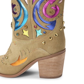 Tan suede cowboy boot with multicolour embroidery, star and moon motifs, gold studs, and a stacked block heel