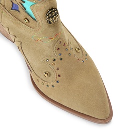 Sand suede cowboy boot toe with turquoise and gold embroidery, stud embellishments, and pointed toe detail on tan sole