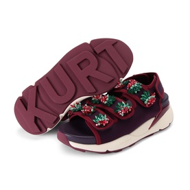 Kurt Geiger London red chunky sandals with floral embellishment, velcro straps, and burgundy branded sole