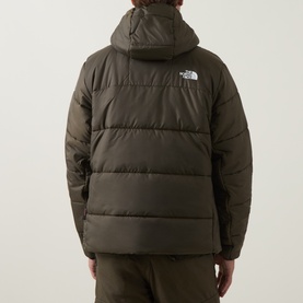 Model wearing North Face casual jacket in New Taupe Green, rear view showing hooded design, quilted panels and branded logo patch.