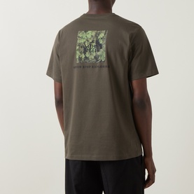 Model wearing North Face Yosemite Oak Logo Back Graphic T-Shirt in New Taupe Green, showing camouflage box logo back print, crew neck, short sleeves.