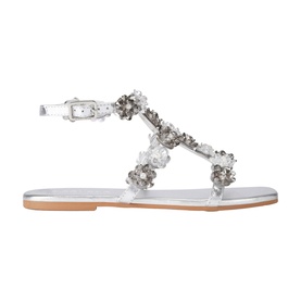 Silver flat sandal with clear straps, crystal and pearl floral embellishments, ankle buckle fastening, and tan leather insole.