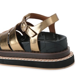 Kurt Geiger London gold metallic strappy sandals with quilted black footbed, chunky flatform sole, and buckle ankle strap detail