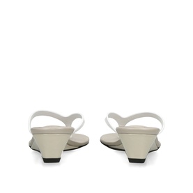 Christopher Esber white leather slingback wedge sandals, block heel with black sole, rear view showing strap detail