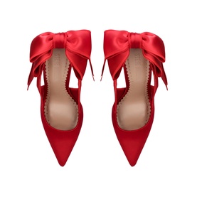 Steve Madden red satin pointed-toe slingback heels with oversized bow detail at ankle, top-down pair view